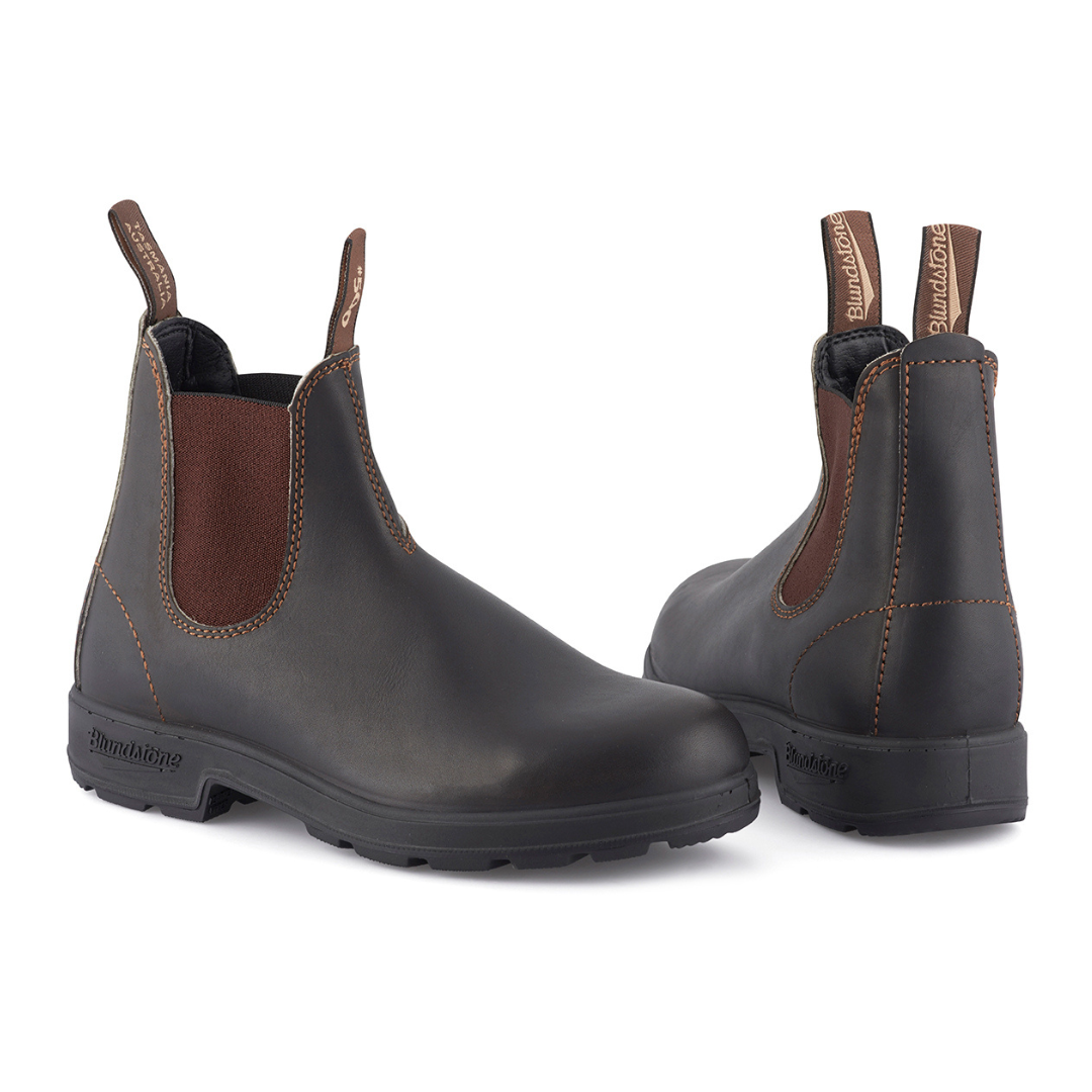 Pair of dark brown Blundstone leather Chelsea boots with a brown elastic side panel and a rubber sole.