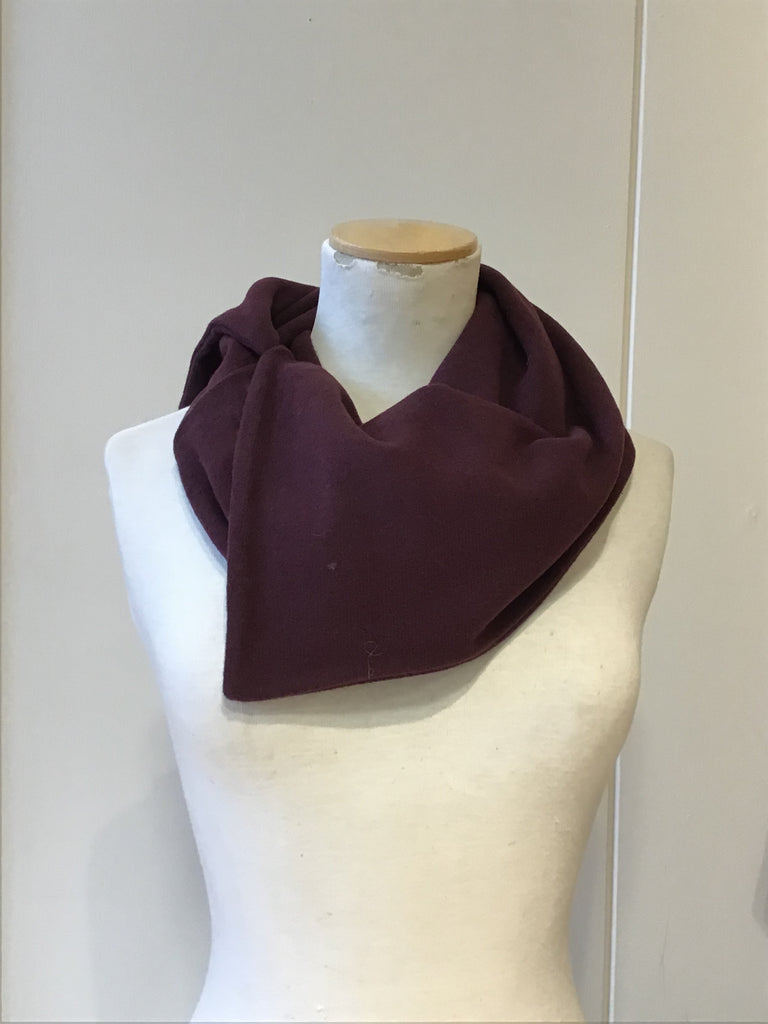 Burgundy cowl neck infinity scarf displayed on a mannequin.  The scarf is made of a soft, possibly fleece-like material.