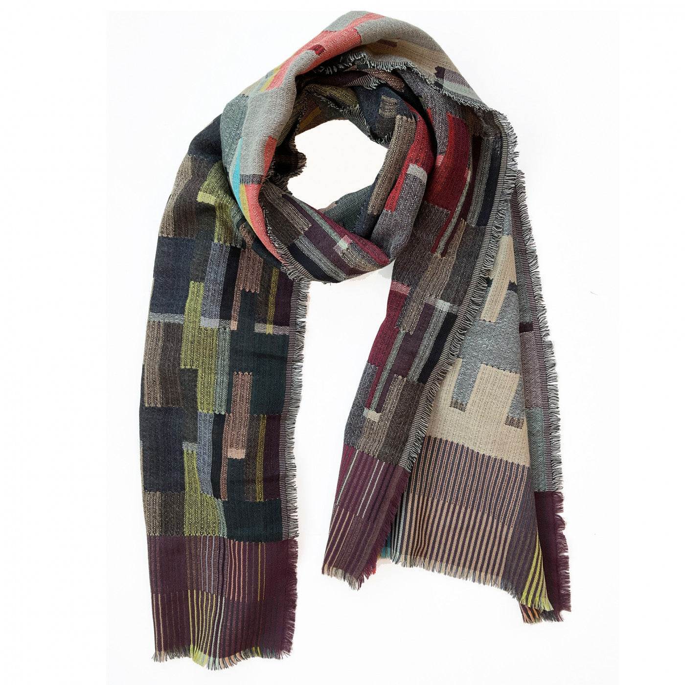 Rectangular wool scarf with a geometric pattern in muted greens, browns, and reds.  The scarf has a frayed edge.