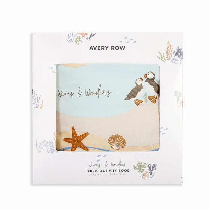 Avery Row fabric activity book with puffins and beach design on a white background