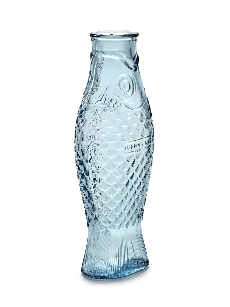 blue, pressed glass carafe, from the Fish & Fish tableware collection, by Italian designer Paola Navone, for Belgian design brand Serax.