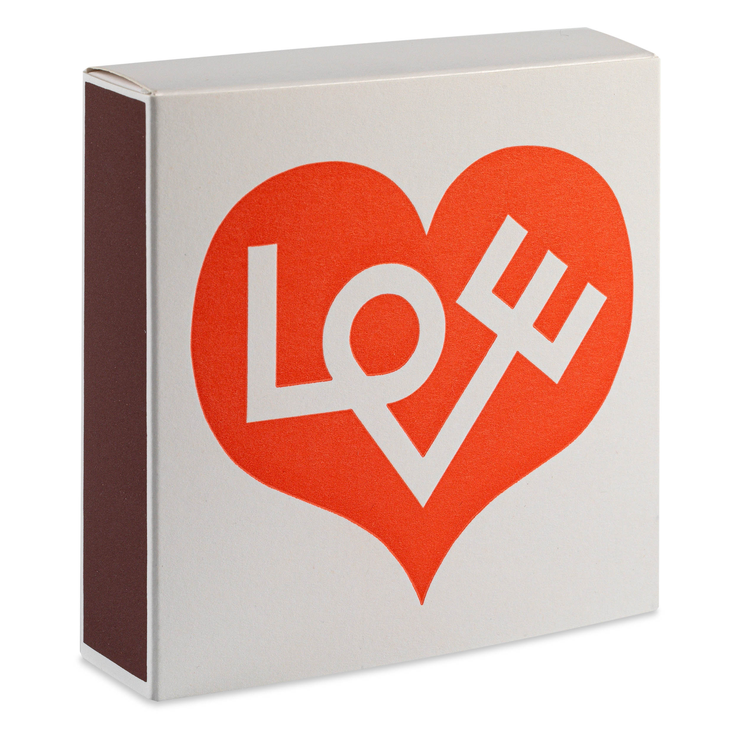 Matchbox with an orange heart graphic containing a stylized "love" design in white.