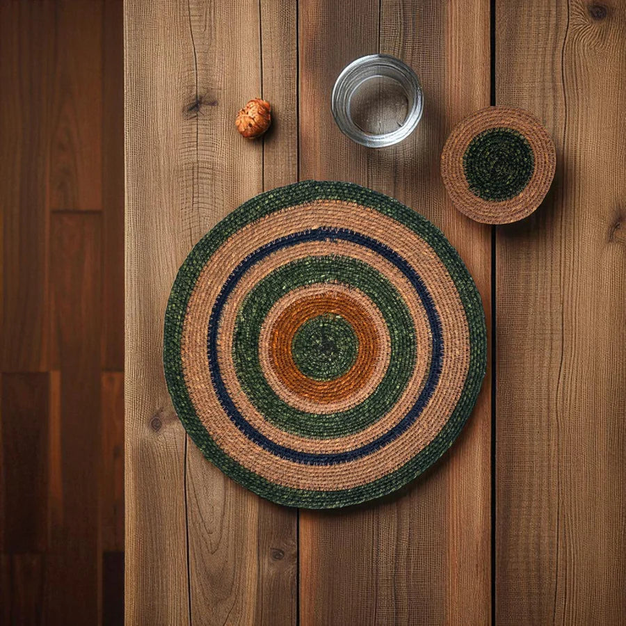 Round woven placemat with concentric circles on a wooden surface