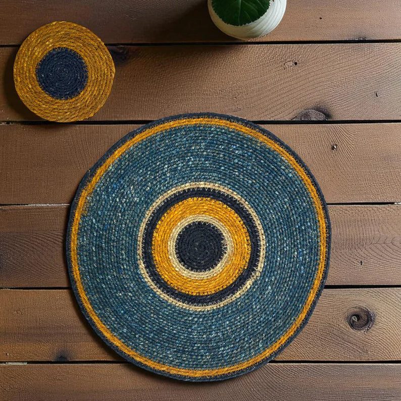 Round woven mat with concentric circles on a wooden surface