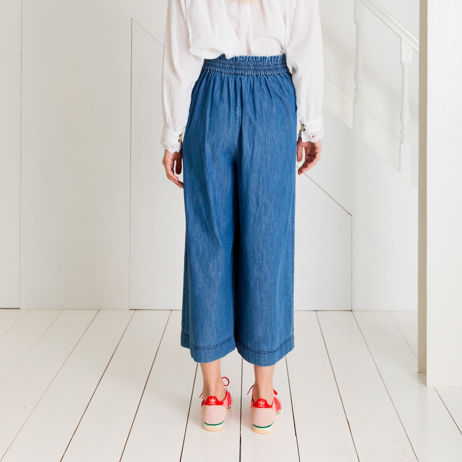 Blue denim culottes with an elastic waistband.