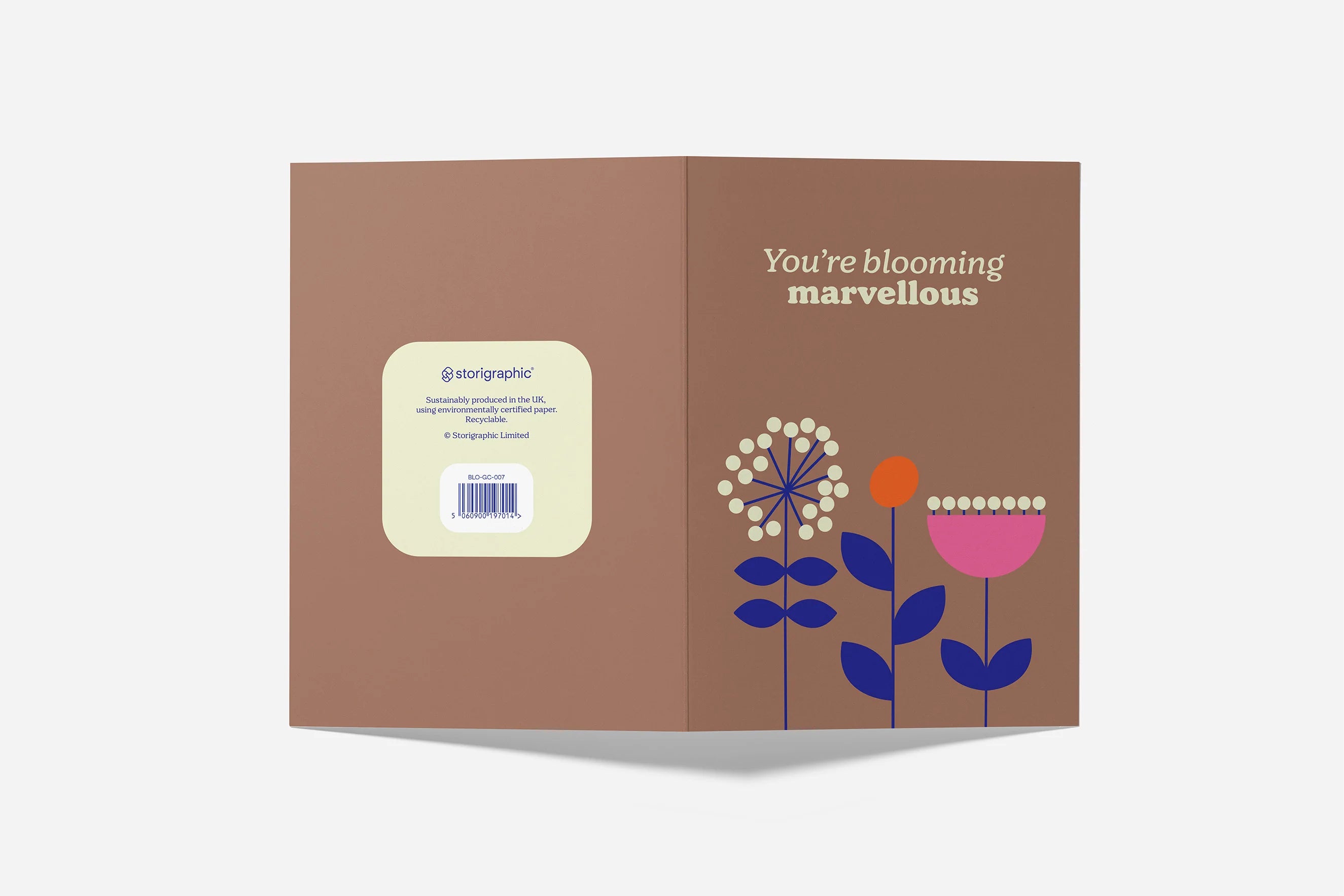 Greeting card with floral design and text 'You're blooming marvellous' on a brown background