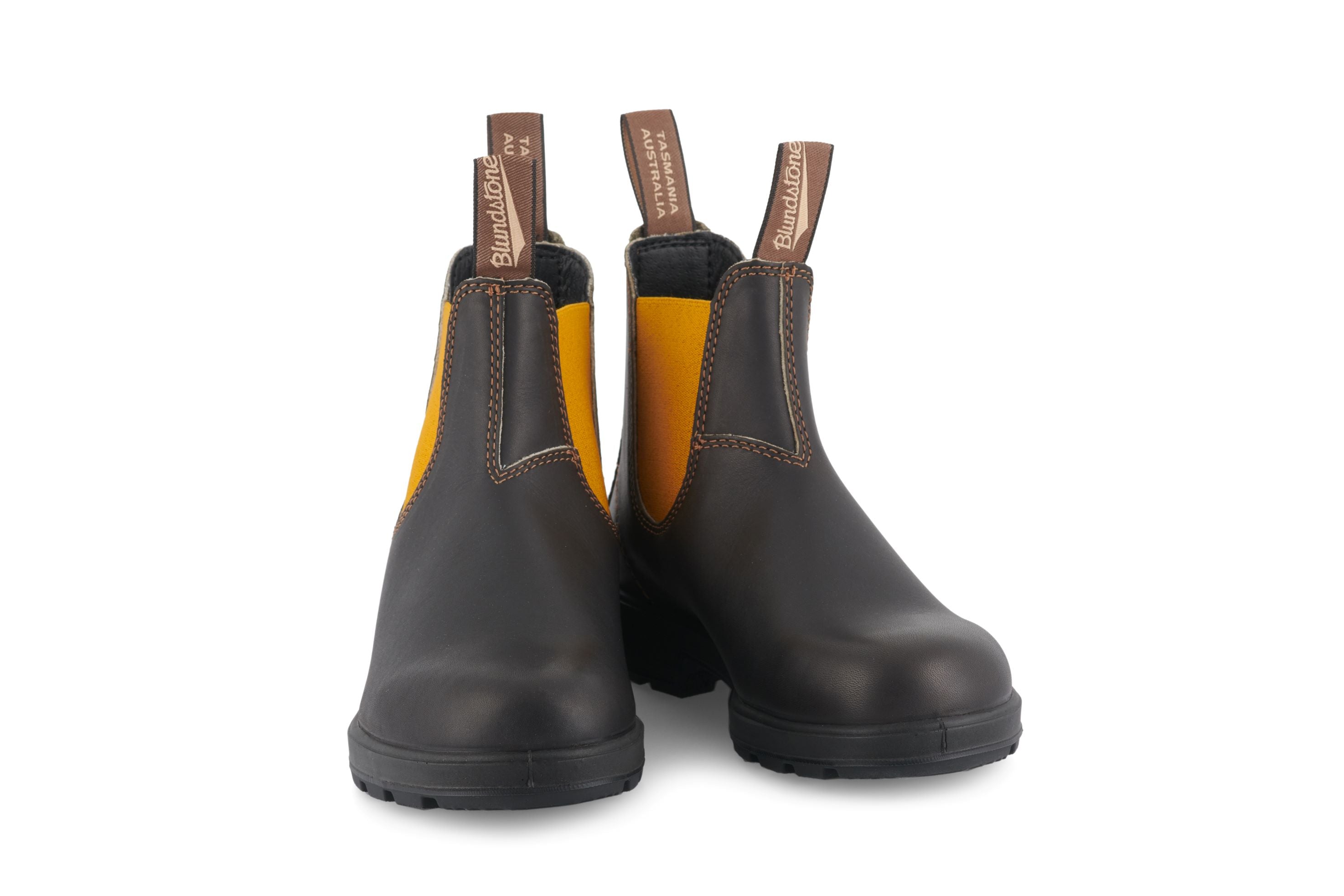Pair of Blundstone Chelsea boots in dark brown leather with a yellow leather topline.  The boots have a durable rubber sole.