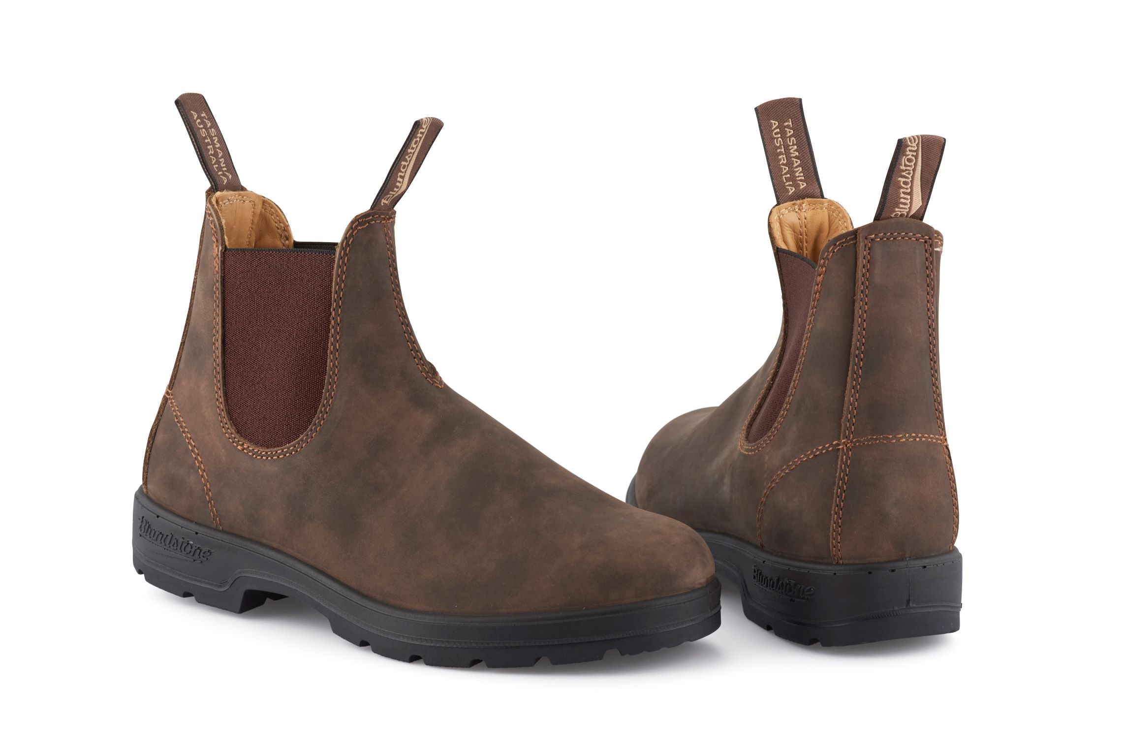Pair of brown Blundstone Chelsea boots with textured leather and a rugged outsole.