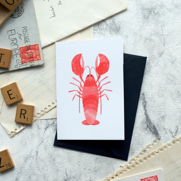 Red lobster illustration on a greeting card.