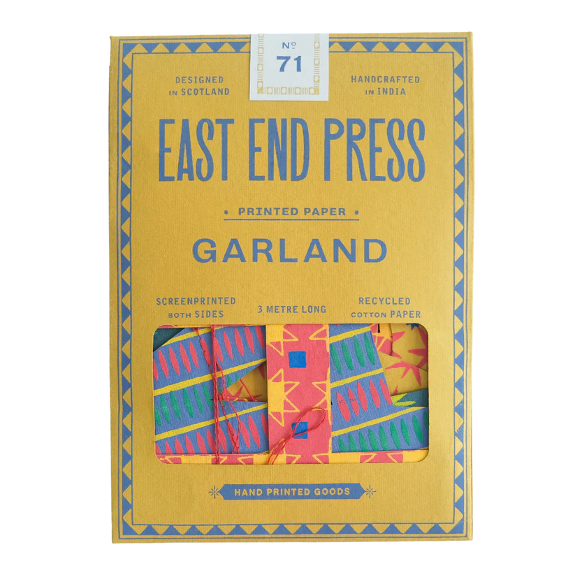 Packaged product from East End Press with colorful paper garland inside
