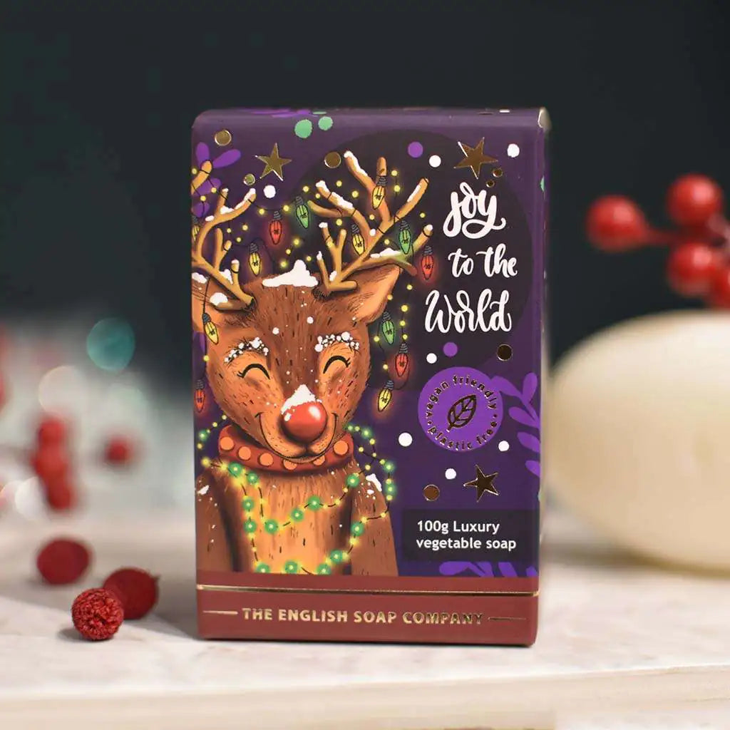 100g The English Soap Company luxury vegetable soap bar featuring a festive reindeer design; "Joy to the World" text.