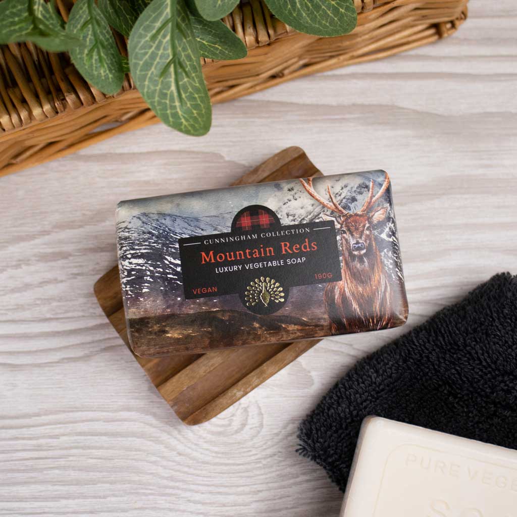 Mountain Reds luxury vegetable soap bar, 190g, vegan, features a stag and winter landscape design.