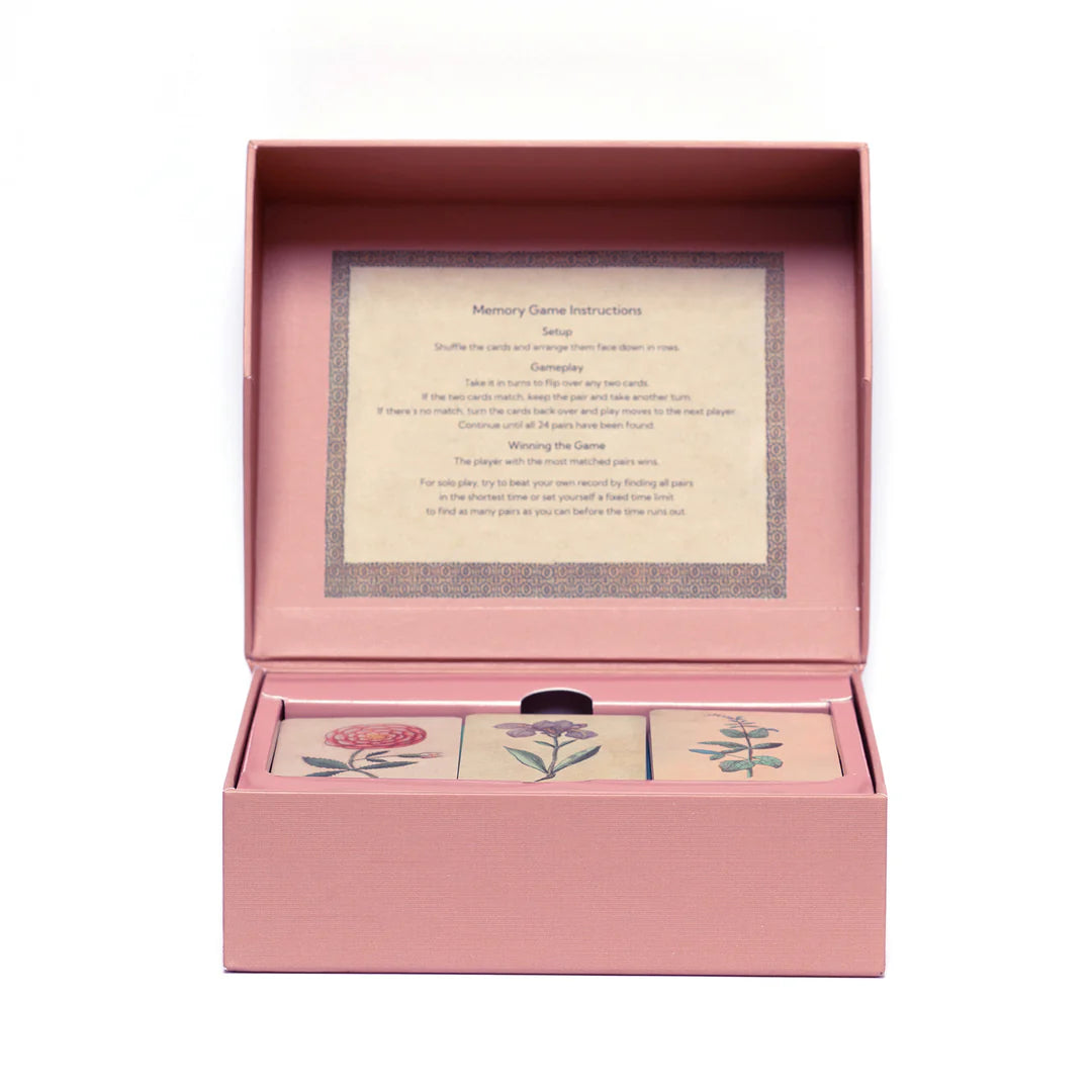 Memory game packaging with cards and instructions on a white background