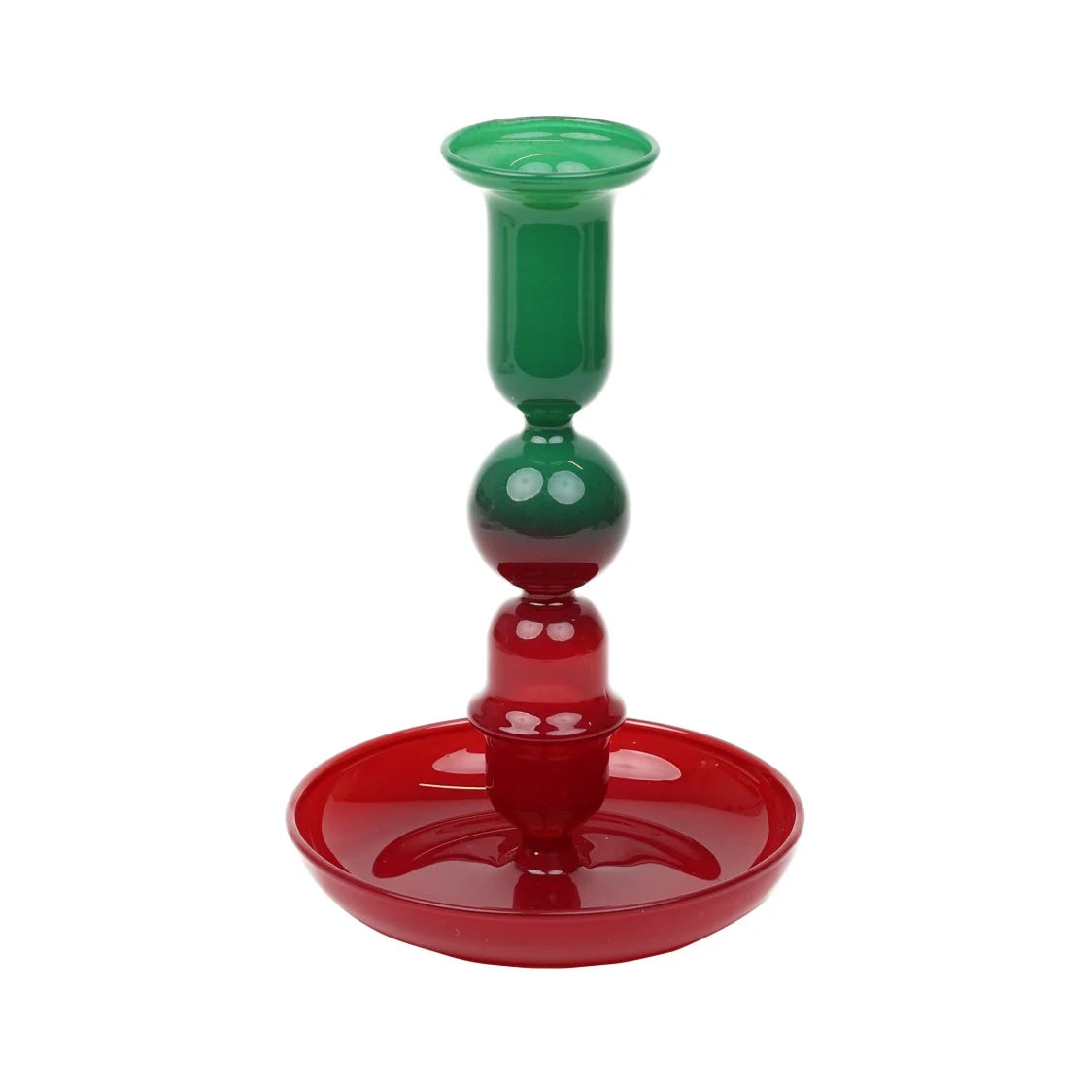 A festive Christmas-themed candlestick holder made of translucent glass, featuring a green candlestick top and stem that fades into a red base and shallow saucer, set against a plain white background.