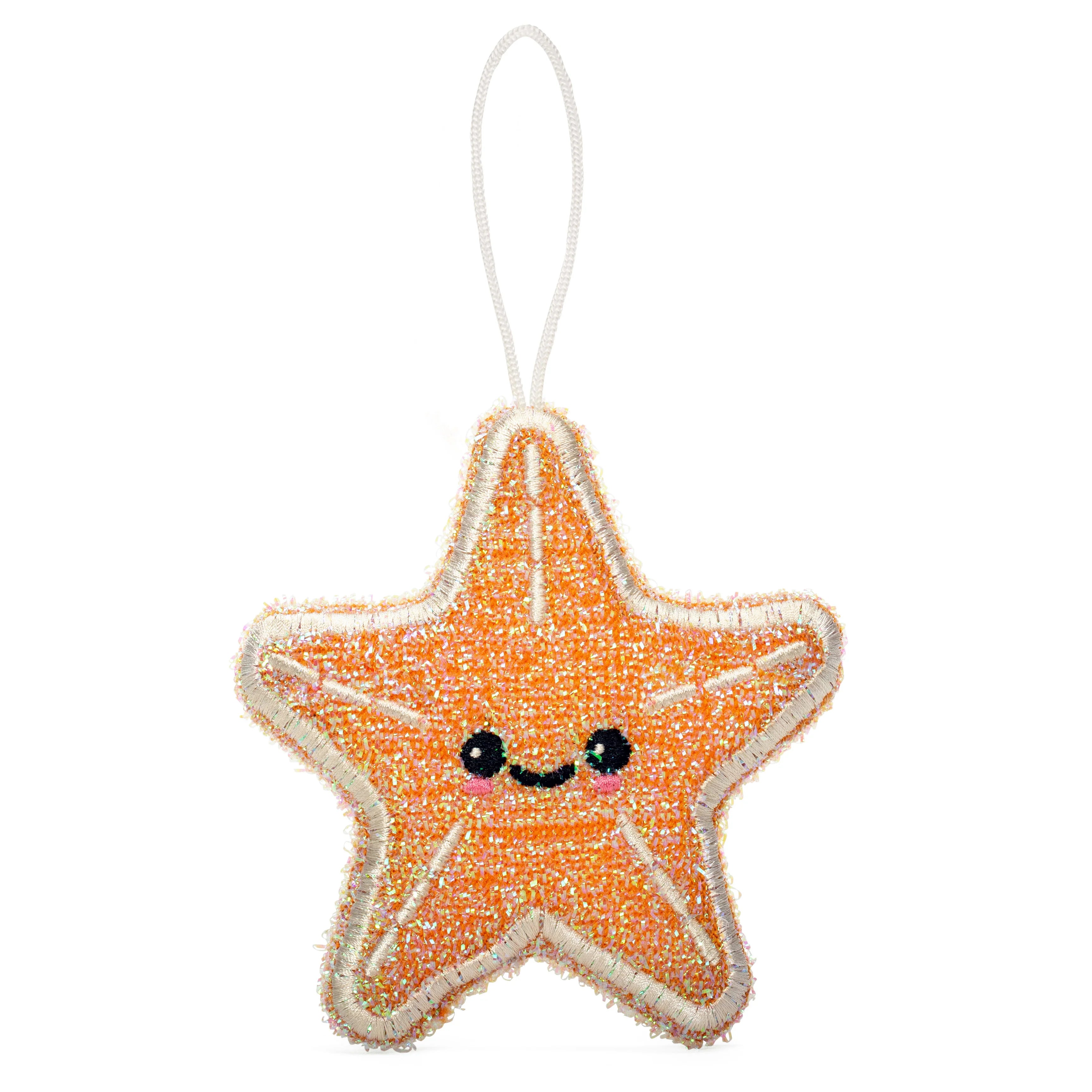 Star-shaped ornament with a happy face on a white background