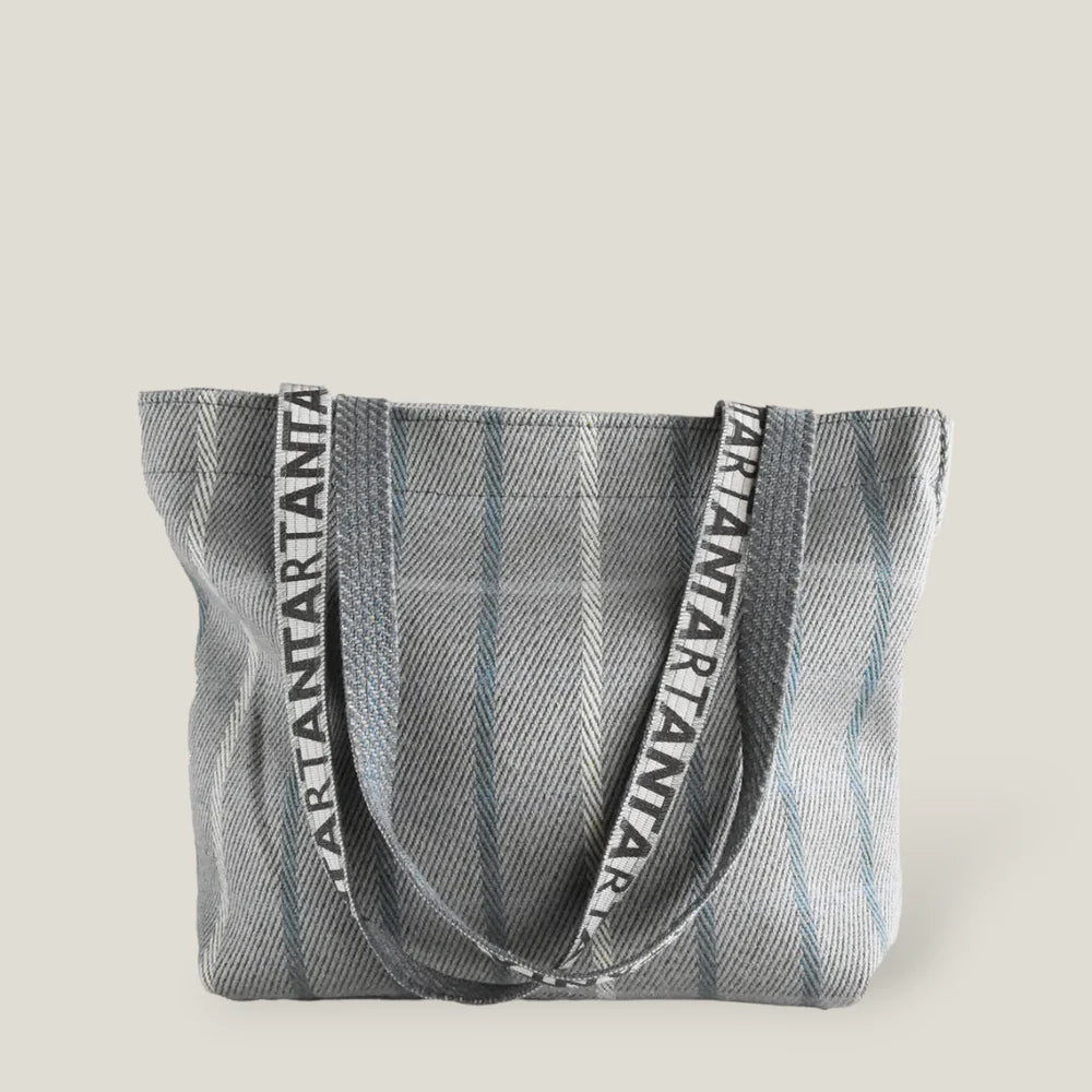 Gray herringbone tote bag with long shoulder straps featuring repeating "ARTANTA" text.