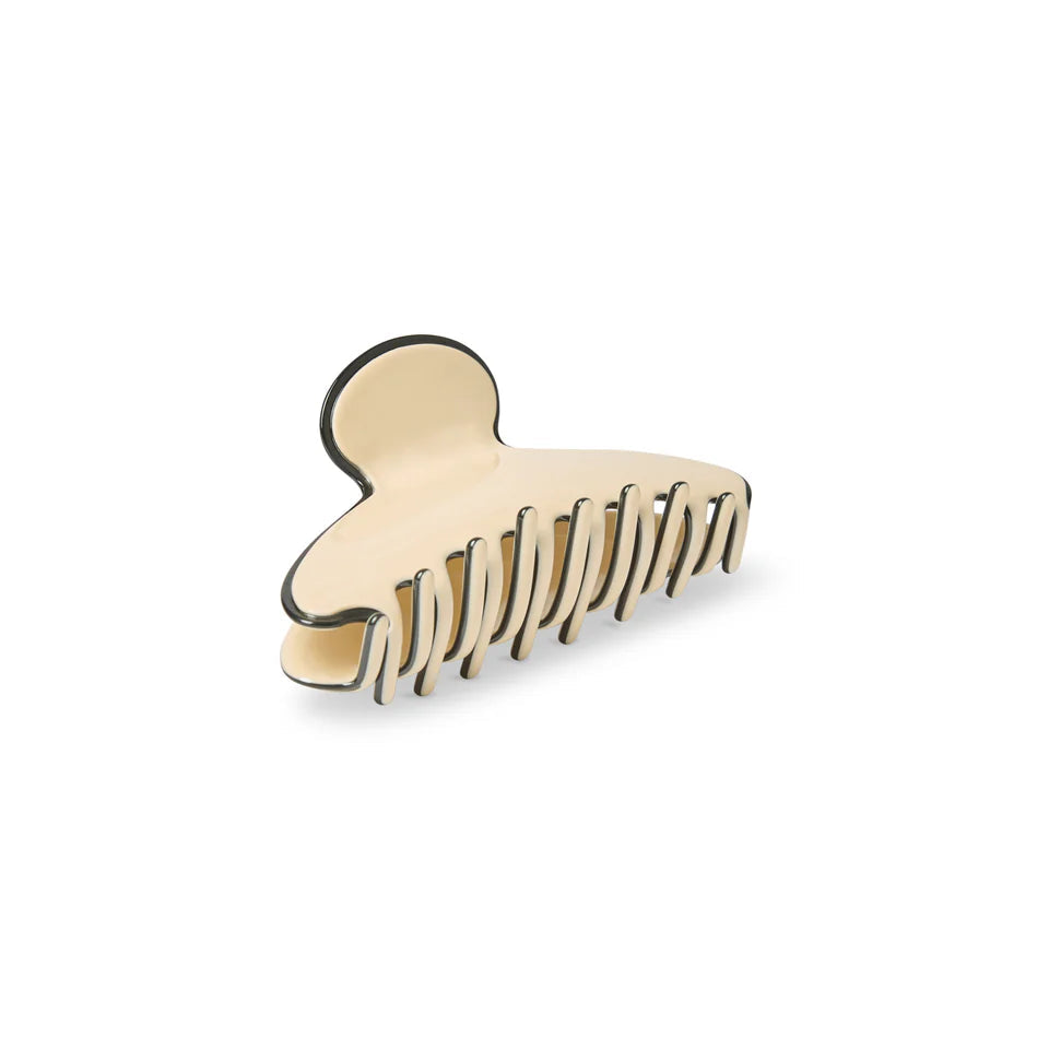 Cream & Black hair comb on a white background