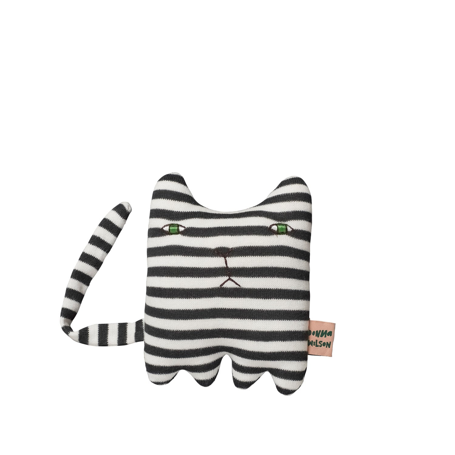 Striped plush cat in black and white with green eyes, by Donna Wilson. Features a playful tail.