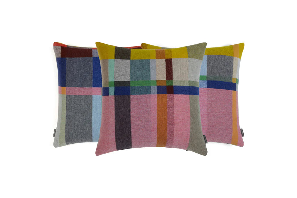 Colorful checkered pillow on a white background