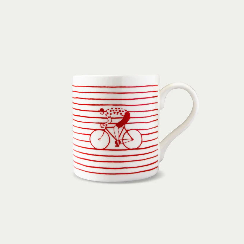 Red striped mug featuring a cyclist on a bicycle.