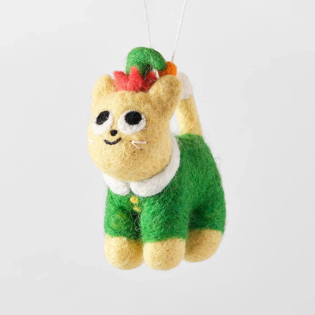 Needle-felted cat ornament wearing a green elf costume and red hat.