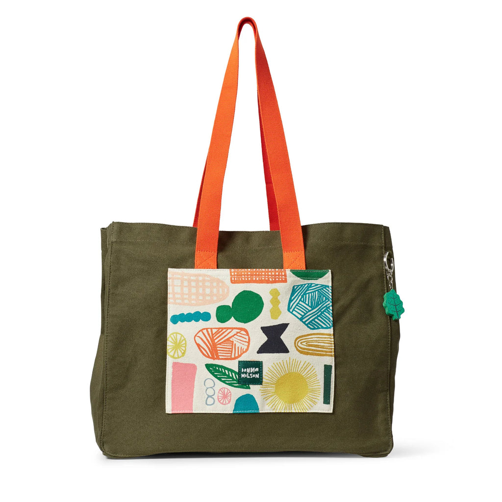 Olive green tote bag with orange straps and a colorful patterned patch, brand Donna Wilson.