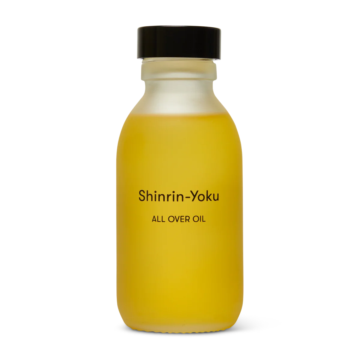 A frosted glass bottle filled with yellow Shinrin-Yoku All Over Oil, featuring a black screw cap and black text on the front, set against a plain white background.