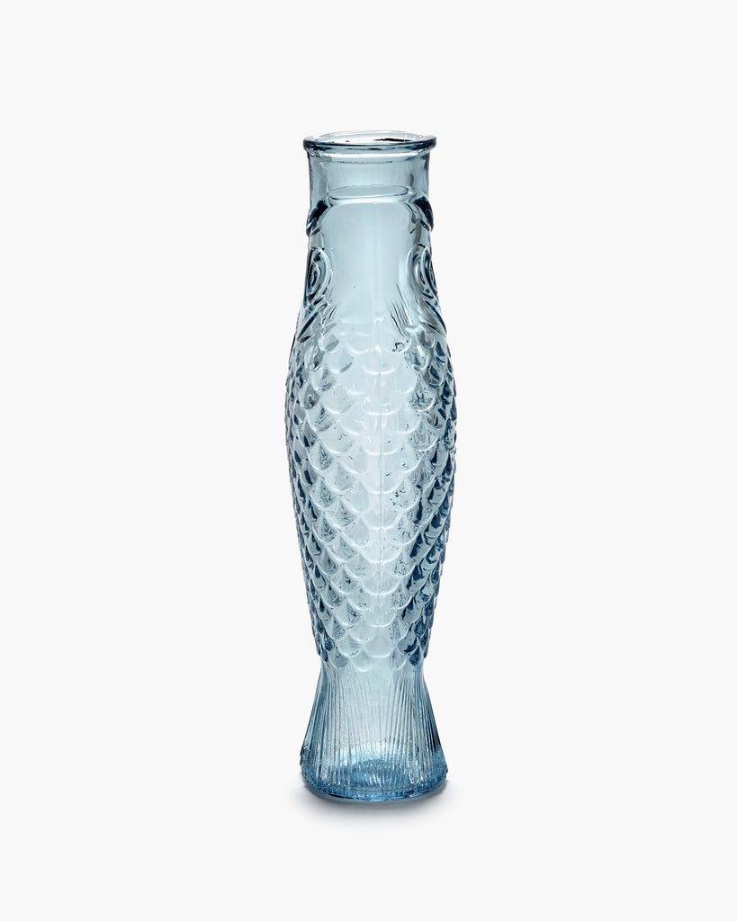 blue, pressed glass carafe, from the Fish & Fish tableware collection, by Italian designer Paola Navone, for Belgian design brand Serax.