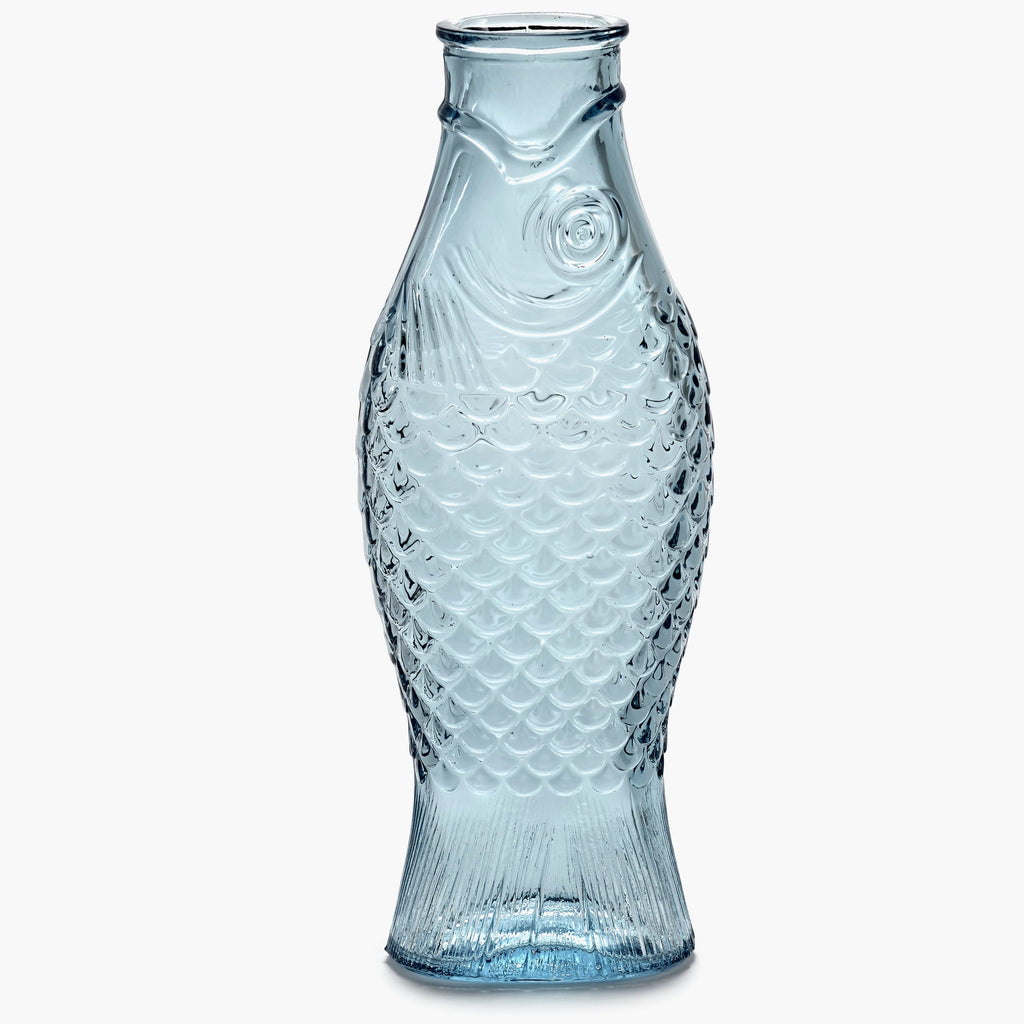 blue, pressed glass carafe, from the Fish & Fish tableware collection, by Italian designer Paola Navone, for Belgian design brand Serax.