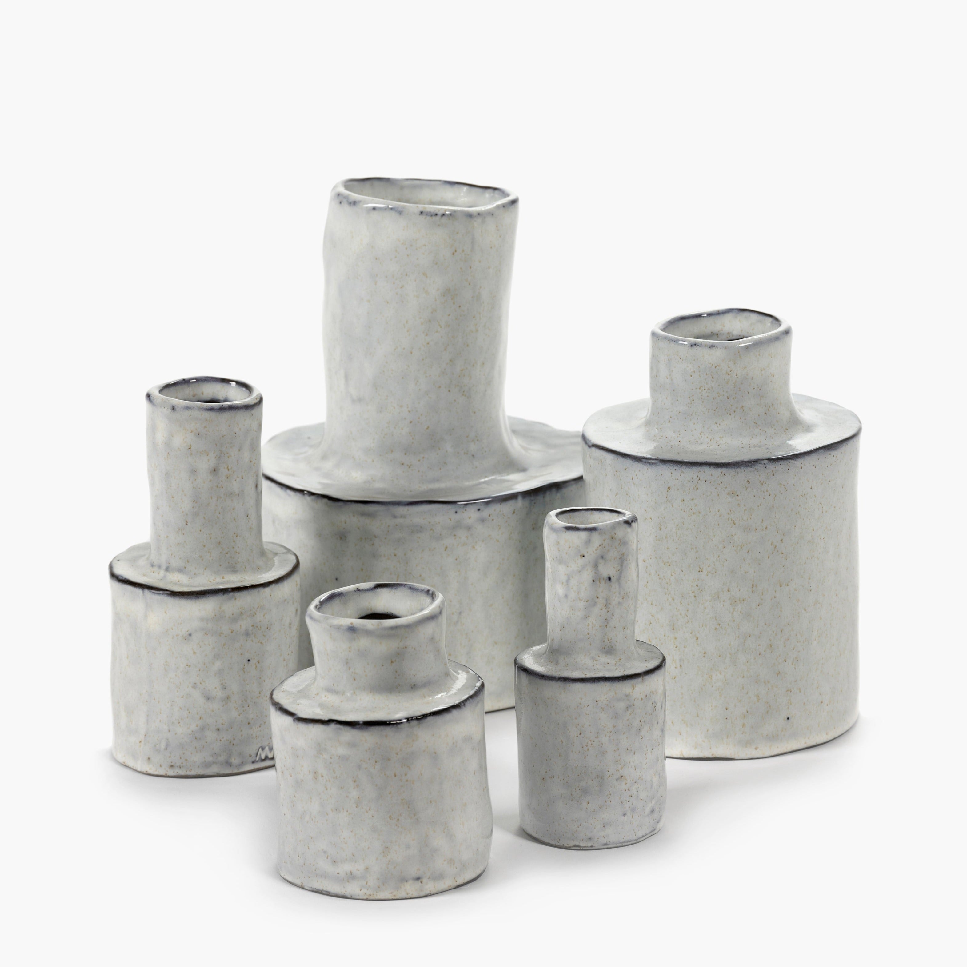 Collection of five small, speckled, light gray ceramic vases with dark gray rims.  Varying heights and shapes.