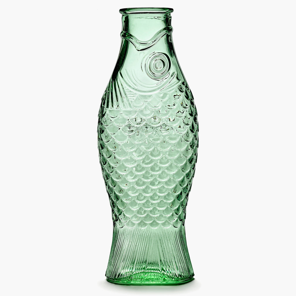 green, pressed glass carafe, from the Fish & Fish tableware collection, by Italian designer Paola Navone, for Belgian design brand Serax.
