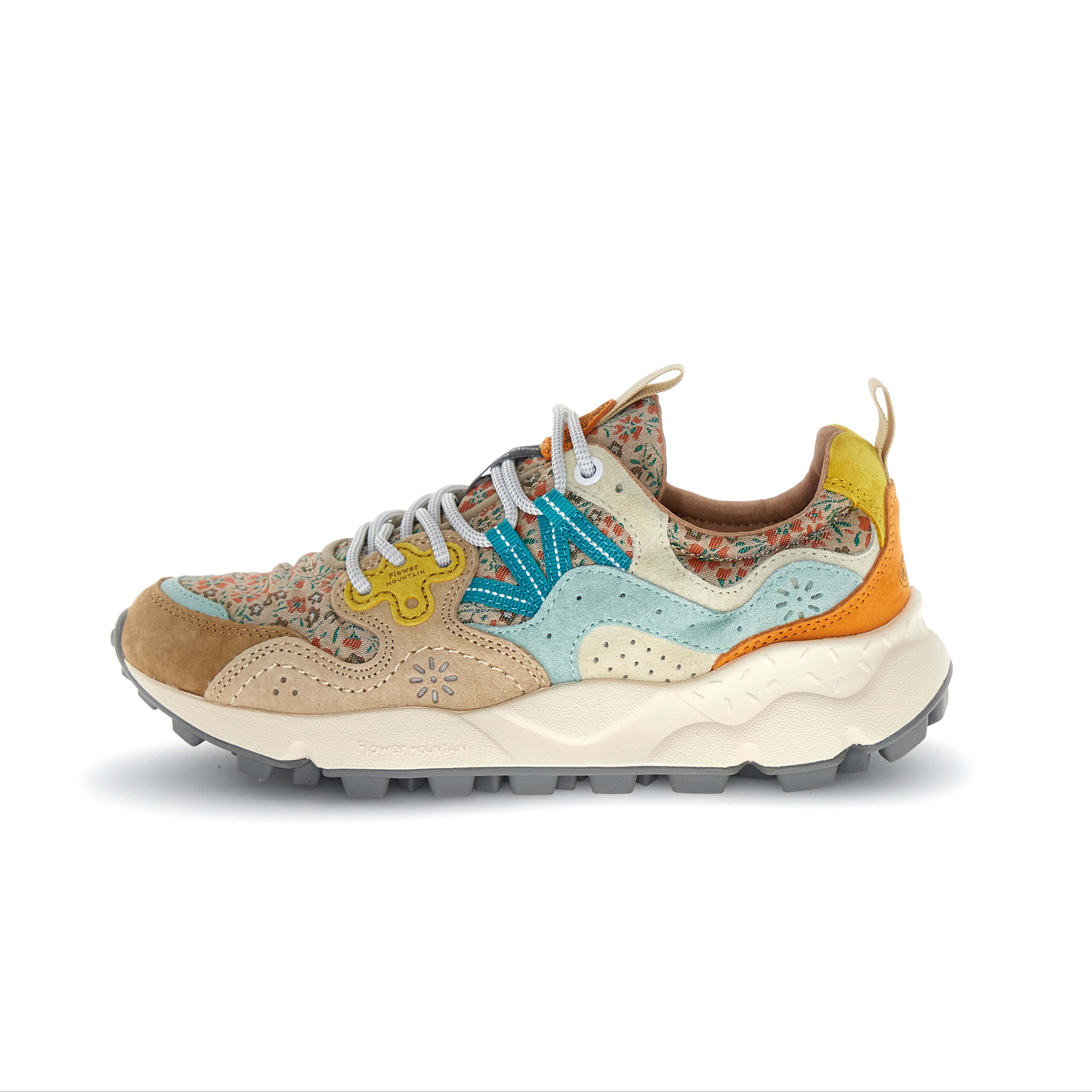 Multicolored sneaker with floral pattern on a white background