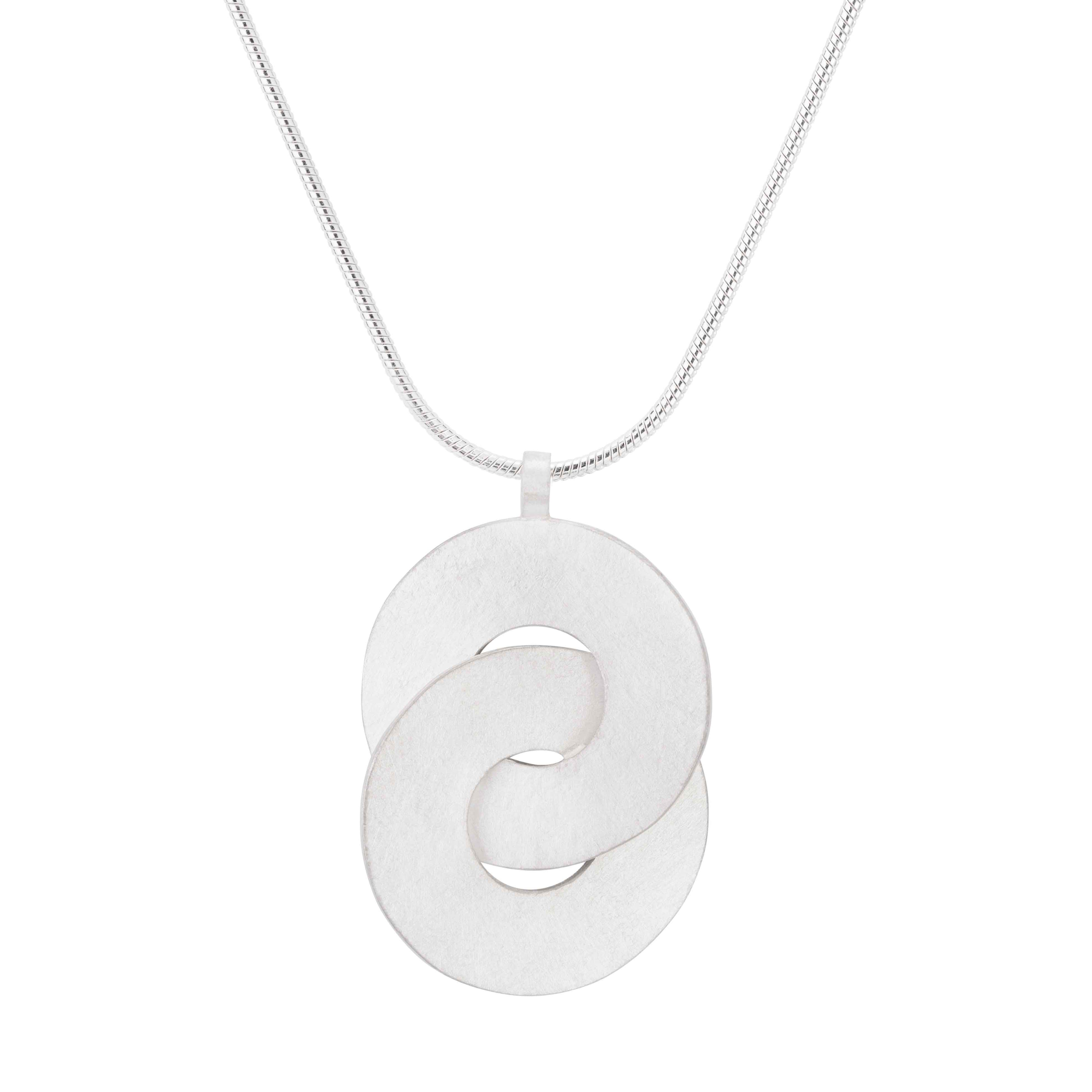 Silver necklace with a pendant featuring two interlocking circular shapes.  The chain is a snake chain style.