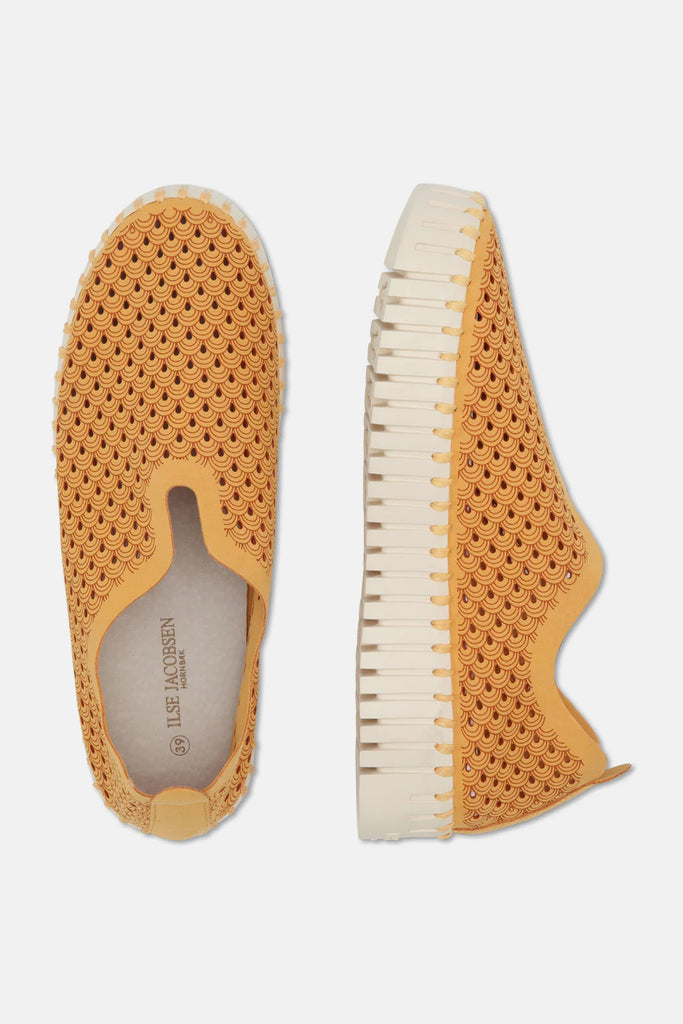 Ilse Jacobsen Hornbæk mustard yellow slip-on shoes with a textured, patterned upper and off-white sole.