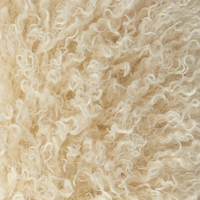 Textured cream fabric from Chalk UK, featuring a curly, soft finish for cozy style.