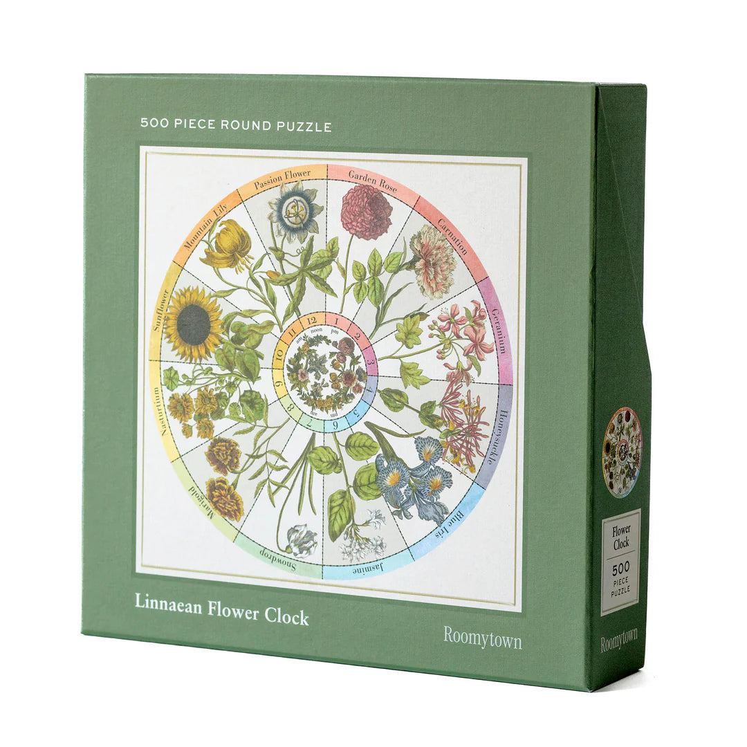 Puzzle box with a Linnæan Flower Clock design on a green background