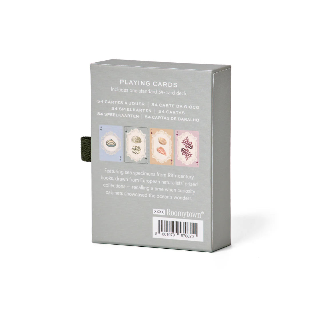 Box of playing cards with illustrations on a white background