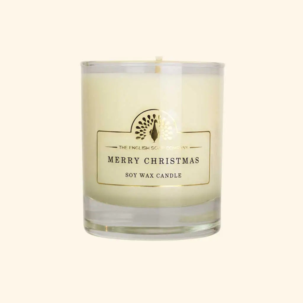 Merry Christmas soy wax candle with a label on a white background