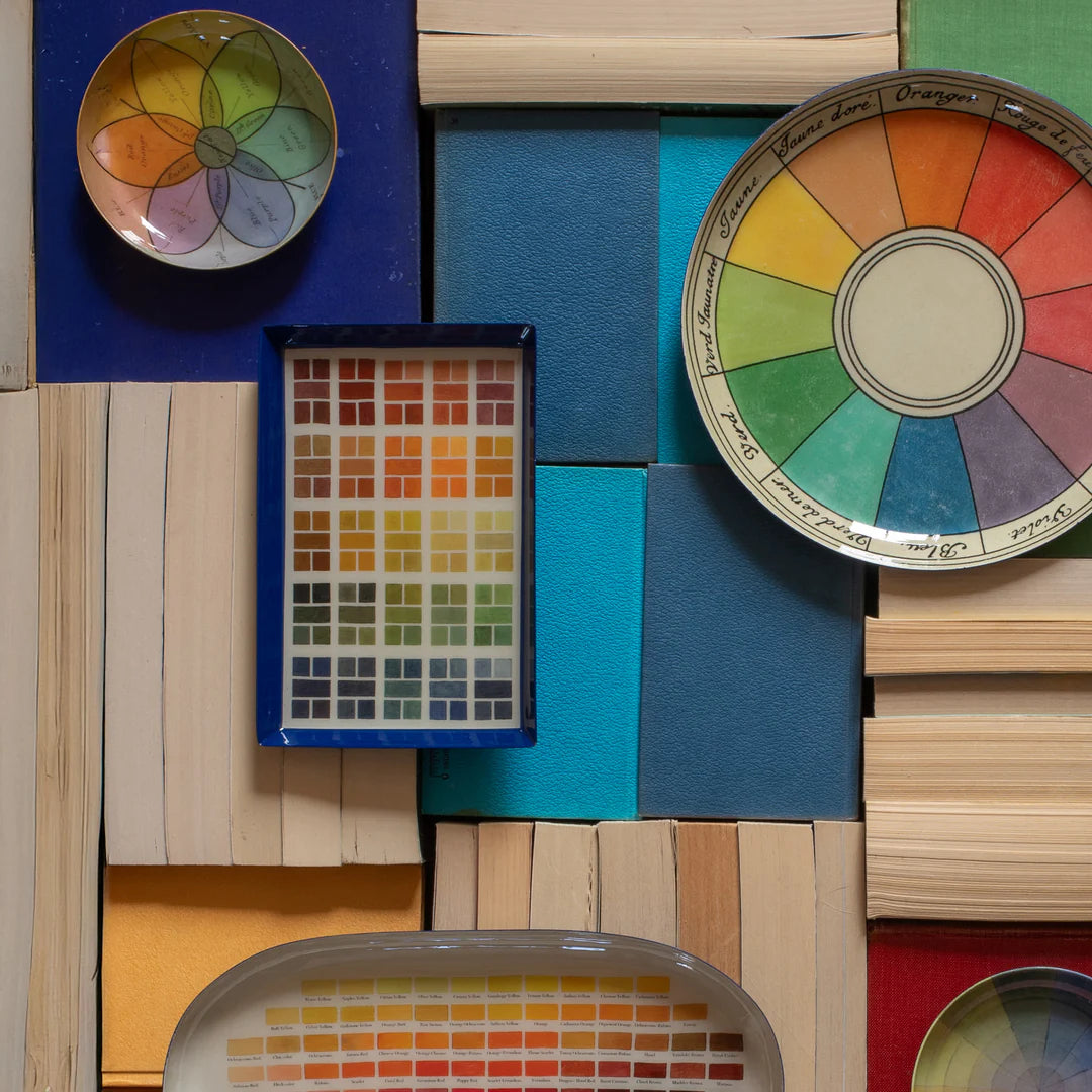 Color swatches and palettes arranged on a textured surface