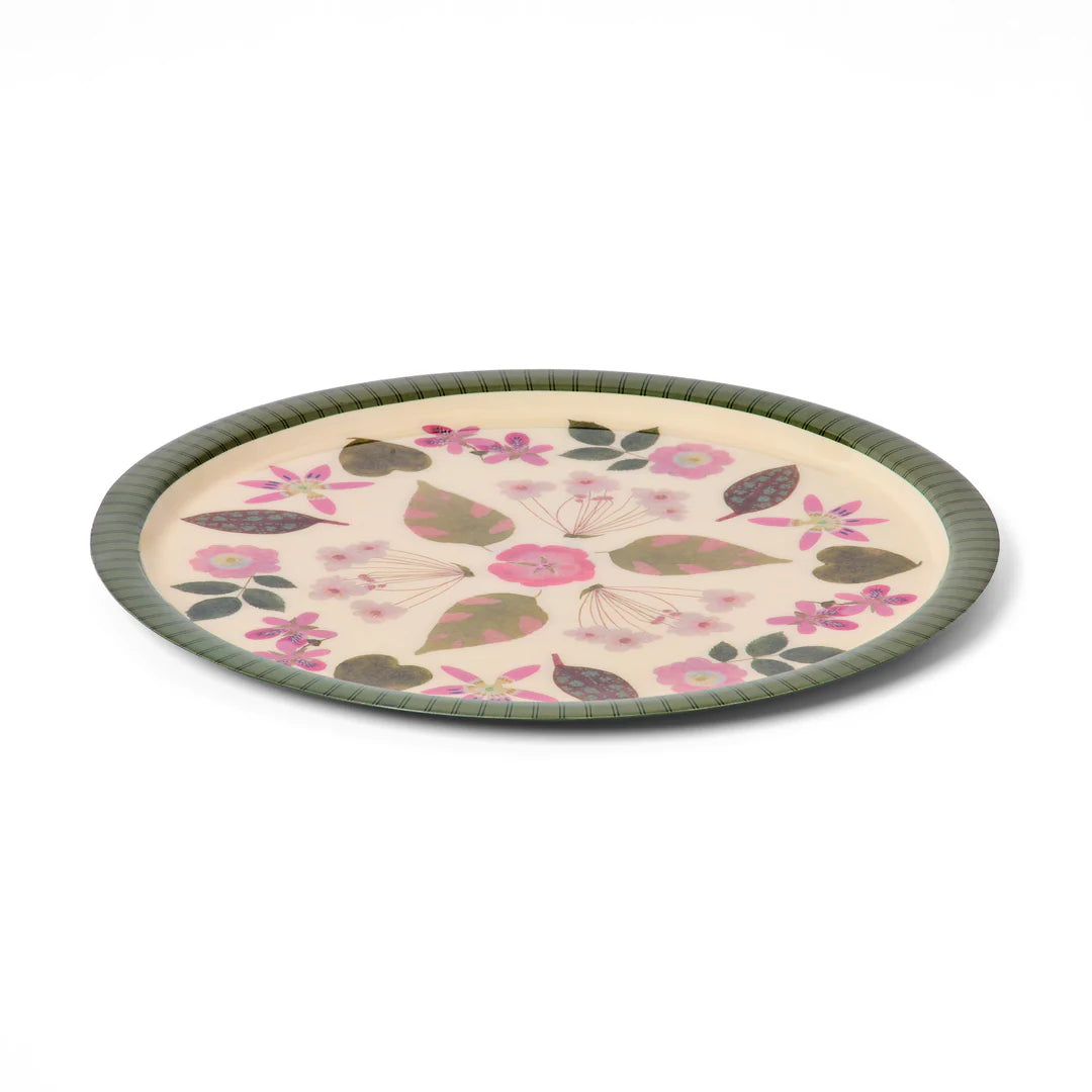 Round placemat with floral pattern on a white background