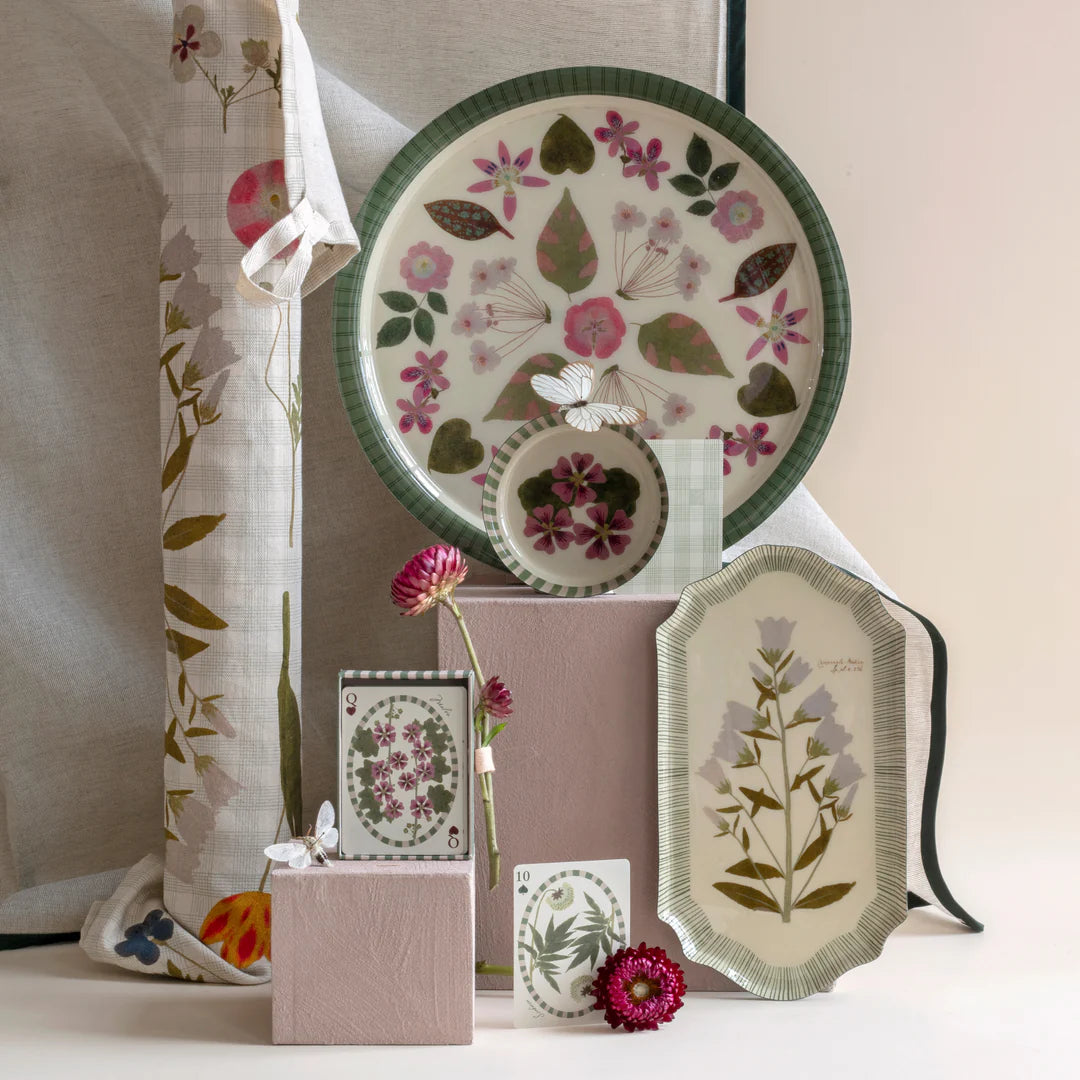 Decorative plates with floral patterns on a neutral background