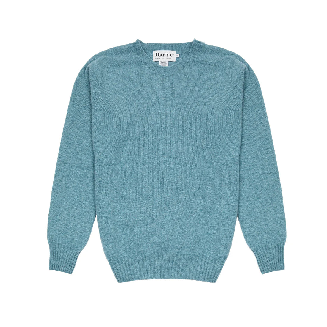 Blue sweater with a brand label on a white background