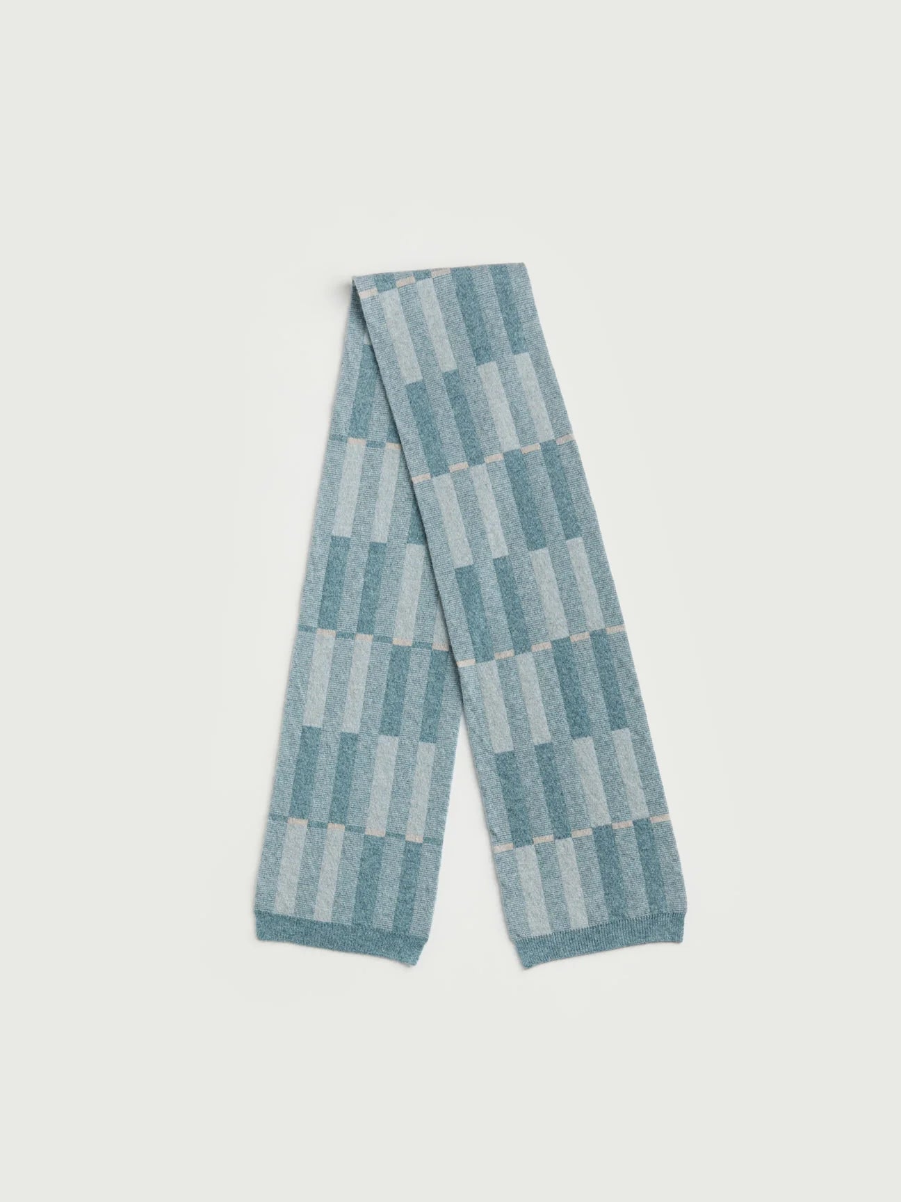 Blue and gray striped scarf on a white background