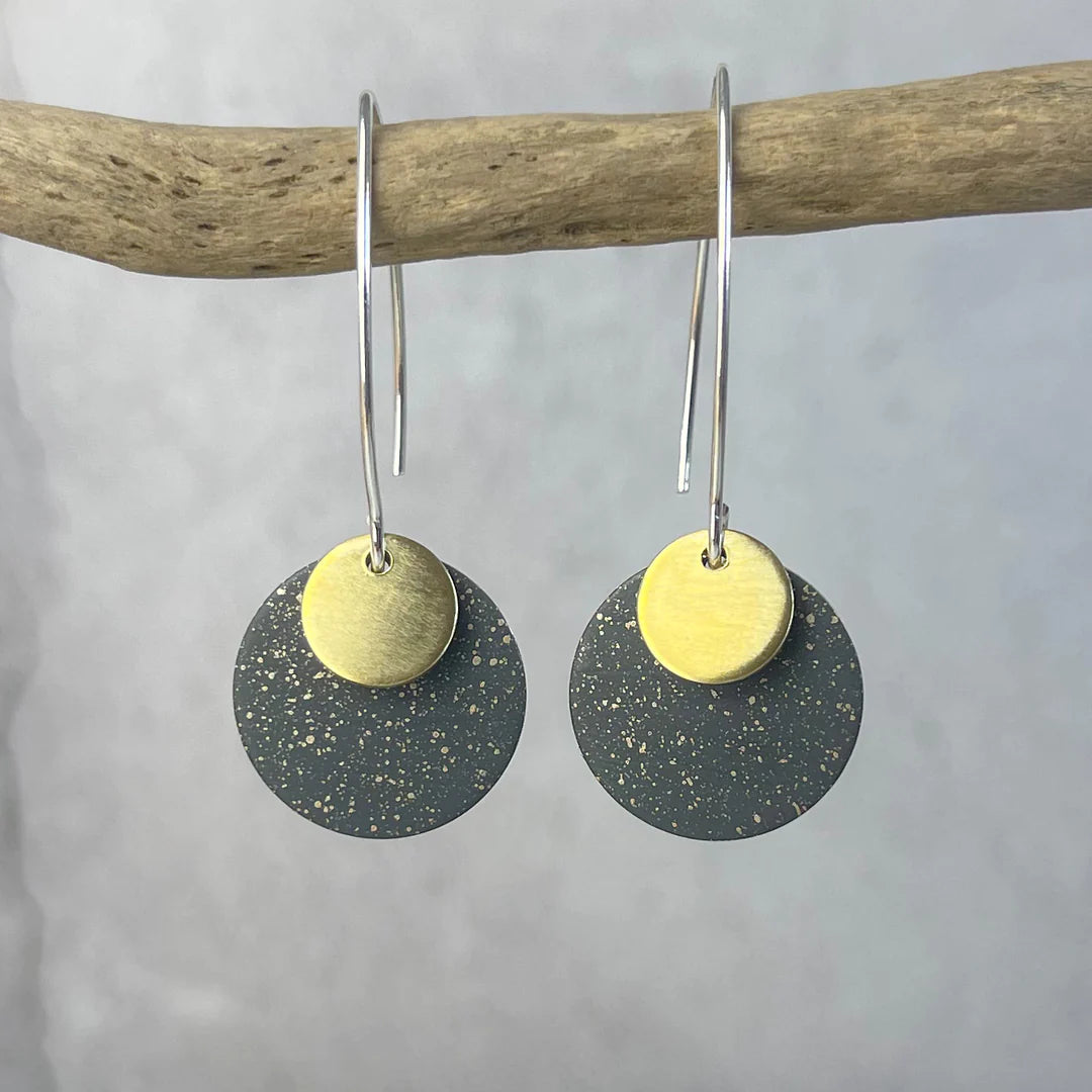 Dark gray and gold speckled disc earrings with silver hooks.