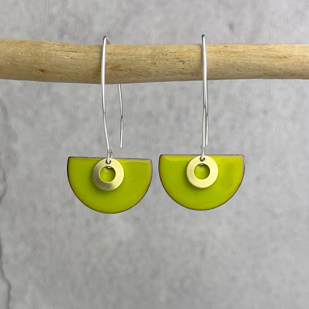 Lime green enamel half-circle earrings with gold circle accents and silver hooks.