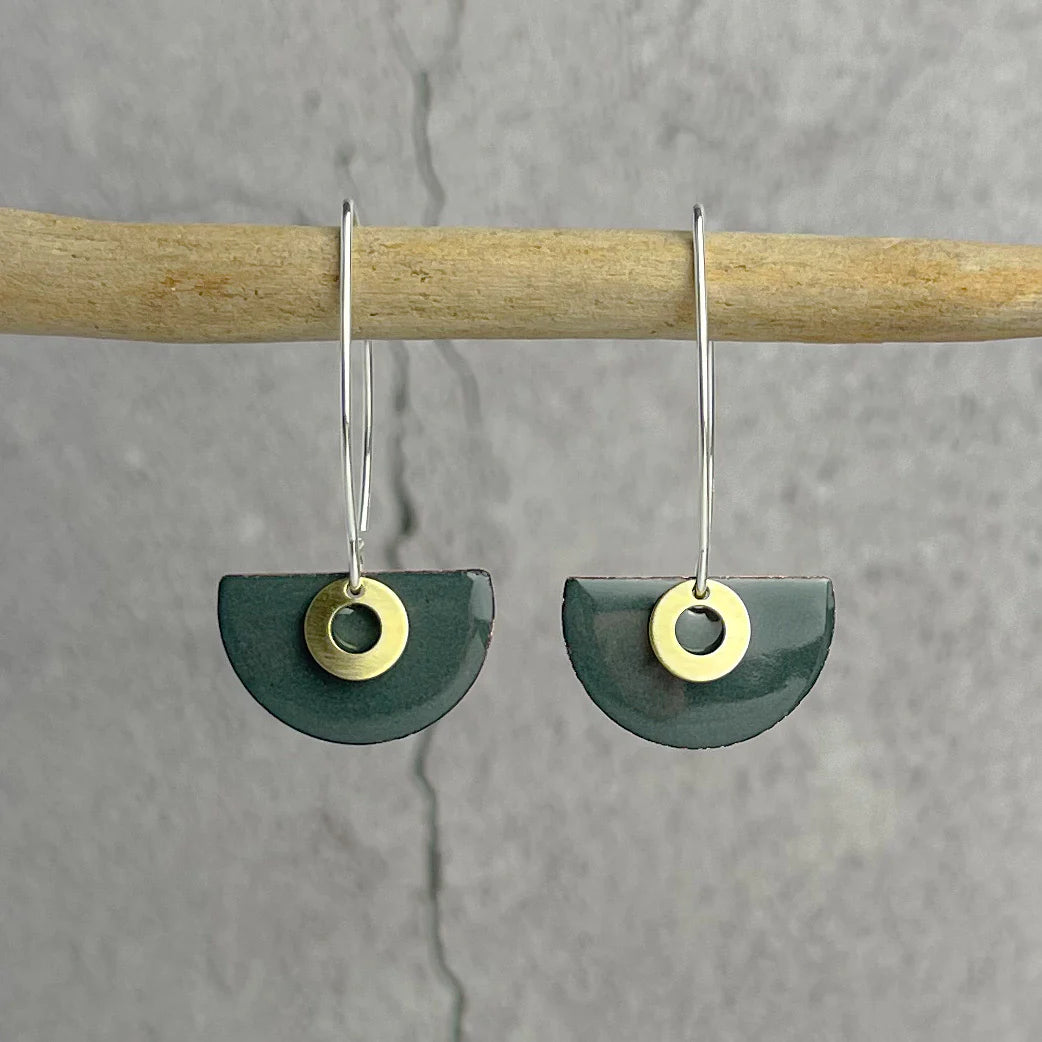 Pair of dark green enamel half-circle earrings with gold circle accents and silver hoops.
