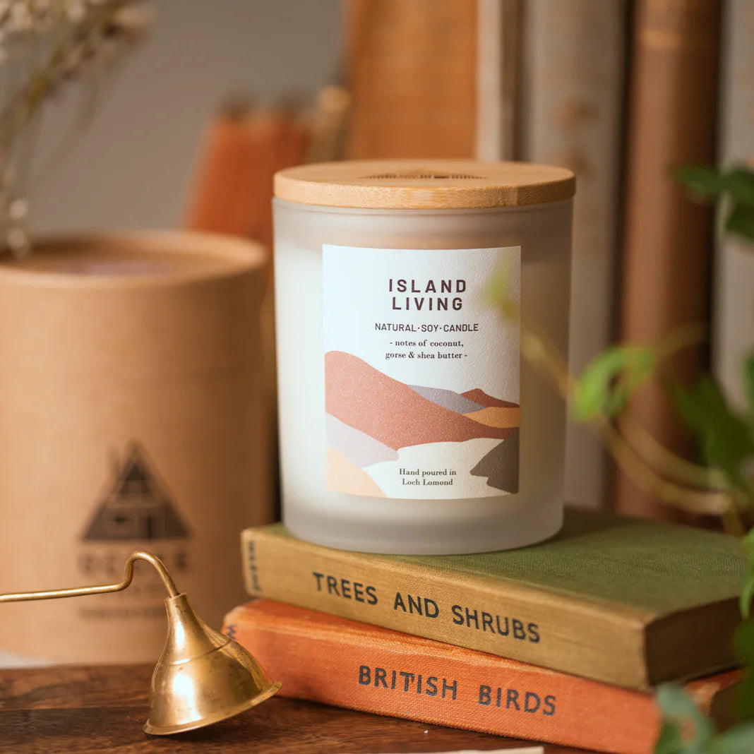 Island Living natural soy candle in frosted glass jar with bamboo lid.  Notes of coconut, gorse & shea butter.