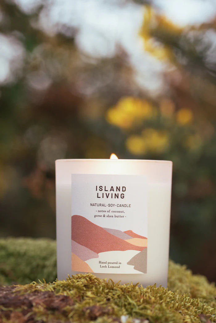 Lit Island Living natural soy candle with notes of coconut, gorse, and shea butter.  Hand-poured in Loch Lomond.