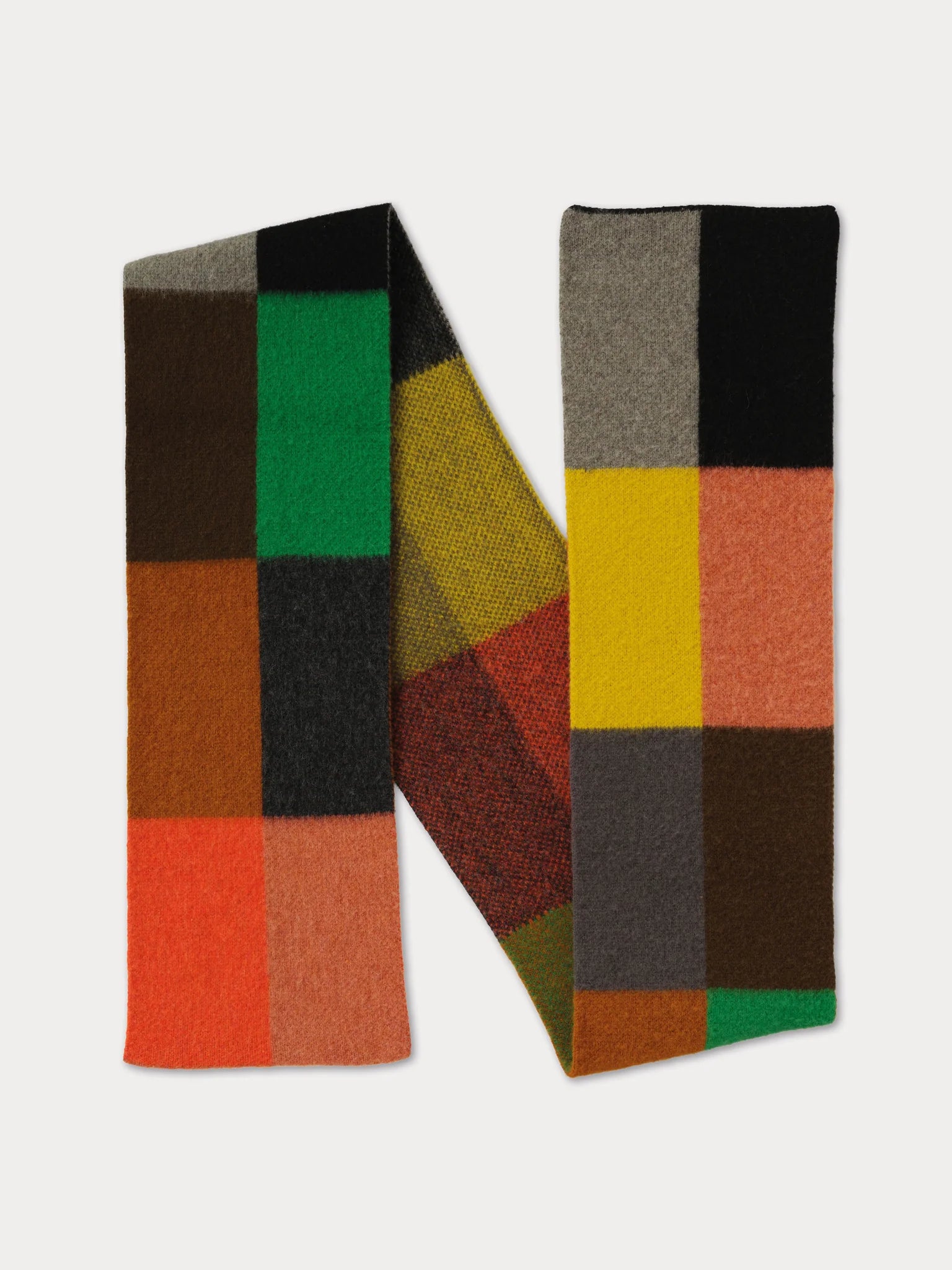 Colorful checkered scarf on a light gray background