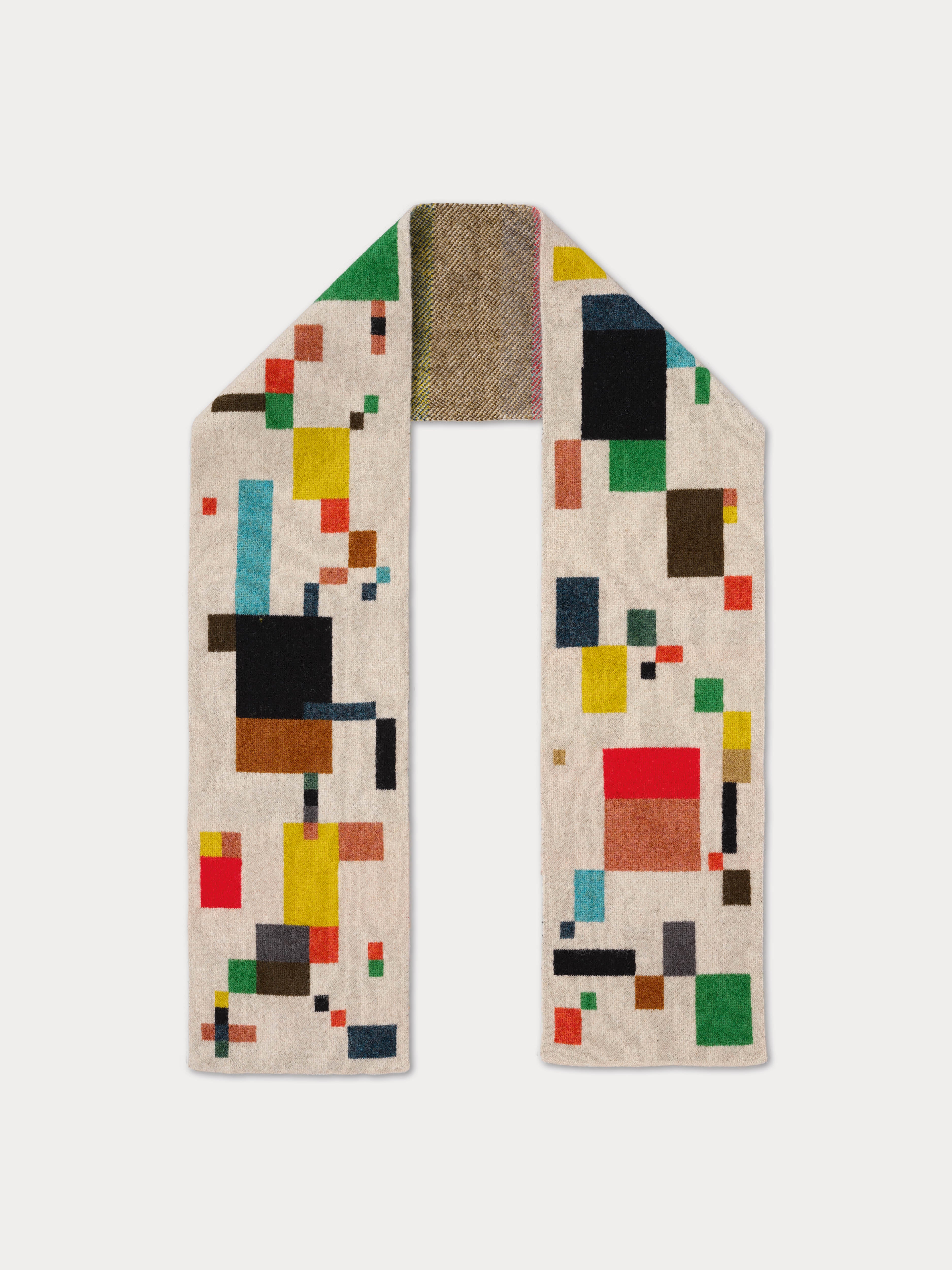 Colorful geometric-patterned scarf on a white background